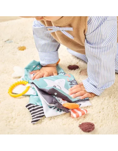 Medžiaginė lavinamoji knygelė kūdikiams gimimo su jūros gyvūnų iliustracijomis.